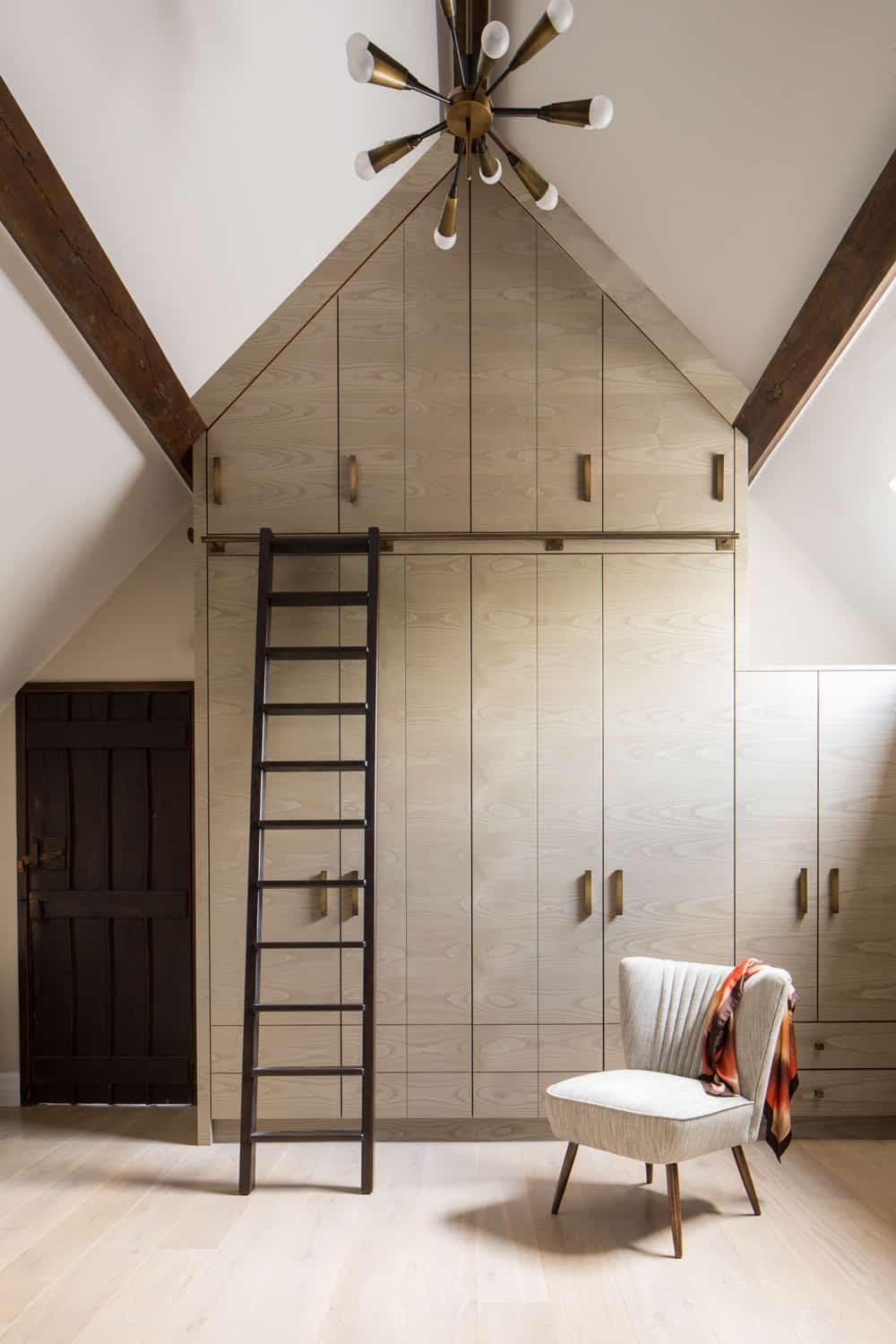 bespoke full-height joinery and storage with metal ladder by roselind wilson design