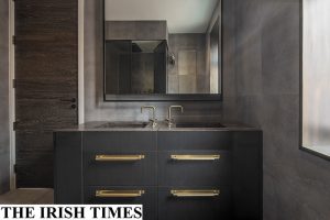 luxury London bathroom with velvet finish limestone walls