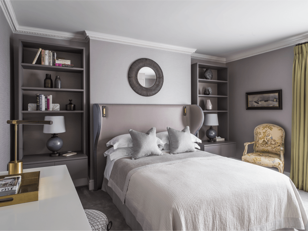 mauve neutral bedroom with moulding