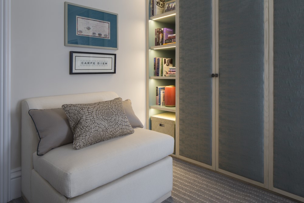 Small spare room with cream pull out with storage