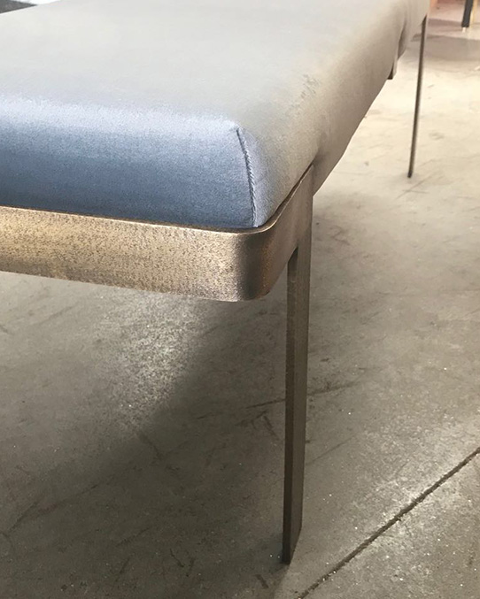 bespoke blue bench with bronze legs